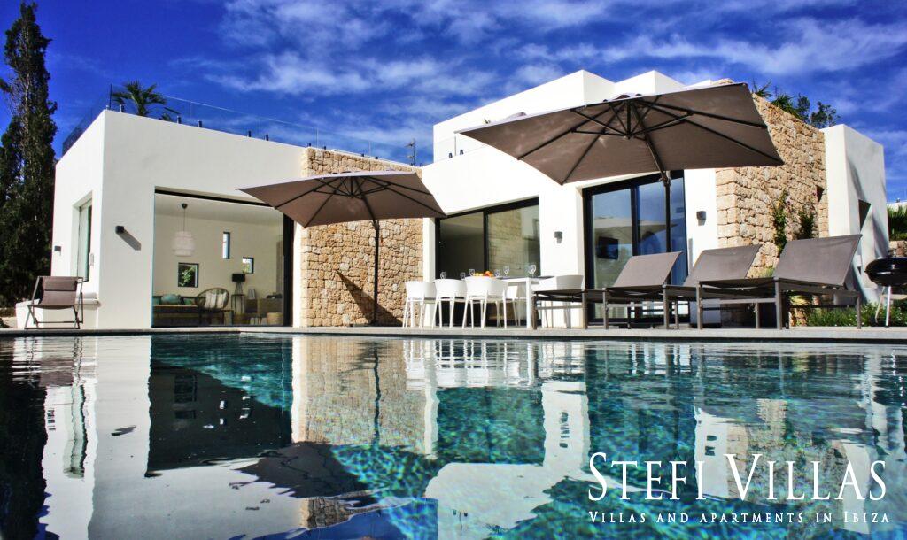 Modern villa with pool on the seafront in Ibiza