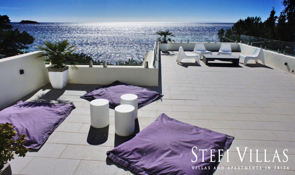 Modern villa with pool on the seafront in Ibiza