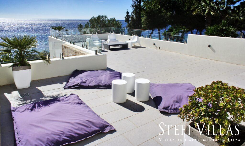 Modern villa with pool on the seafront in Ibiza