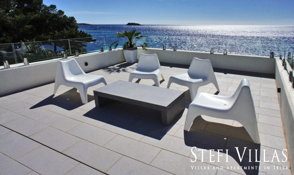 Modern villa with pool on the seafront in Ibiza