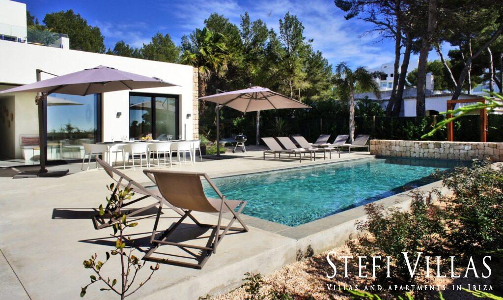 Modern villa with pool on the seafront in Ibiza