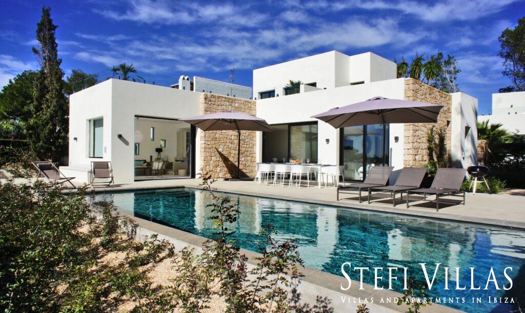 Modern villa with pool on the seafront in Ibiza