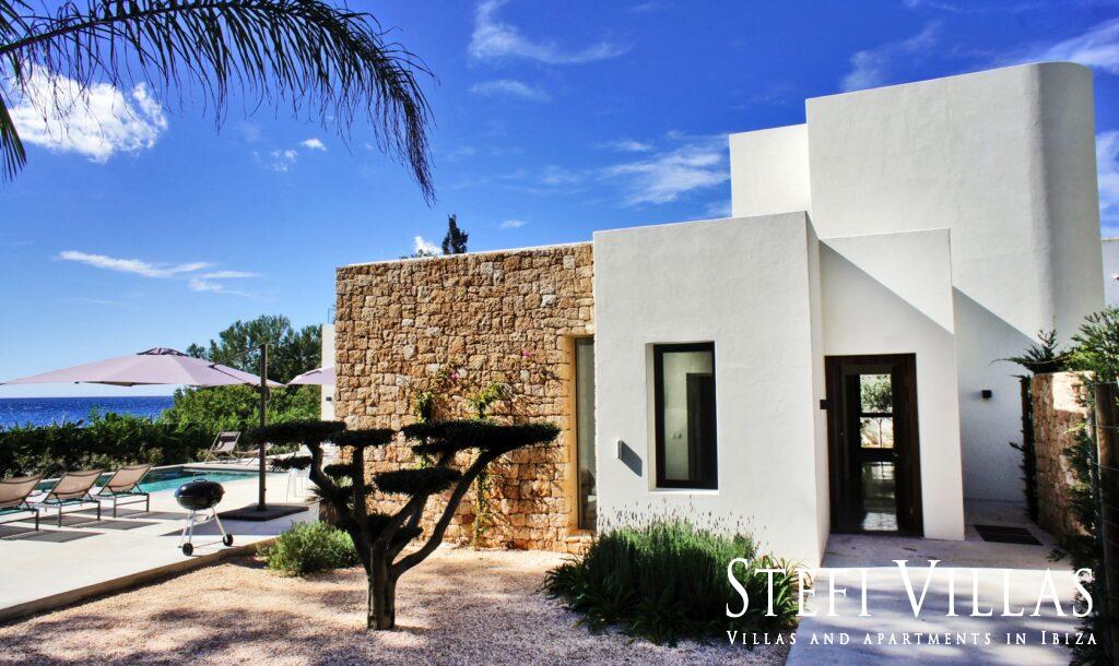 Modern villa with pool on the seafront in Ibiza